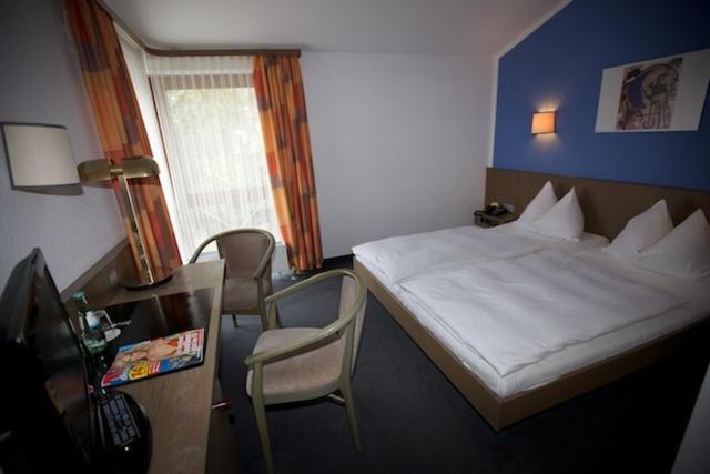 Astra Hotell Ulm Rum bild