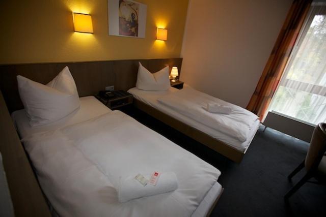 Astra Hotell Ulm Rum bild